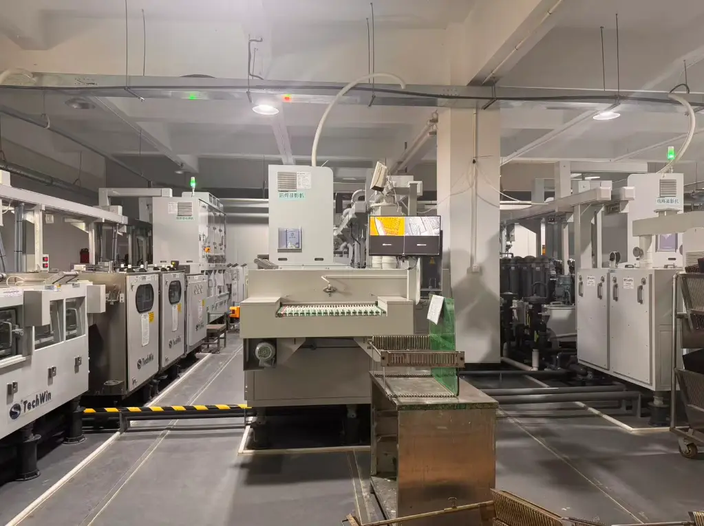 Automated PCB production line featuring TechWin machinery for high-volume printed circuit board fabrication, emphasizing precision and efficiency.